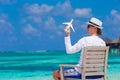 Young man with miniature of an airplane at Royalty Free Stock Photo