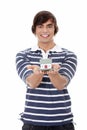 Young man with money and house's model. Royalty Free Stock Photo