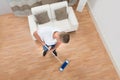 Young Man Mopping Floor Royalty Free Stock Photo