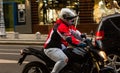 Young man on a motorcycle in Bucharest, Romania, 2021