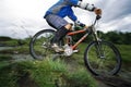 Young man mountain biking Royalty Free Stock Photo