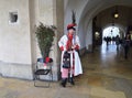 A young man in national Polish costume in Krakow