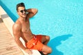 Young man near pool Royalty Free Stock Photo