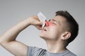 Young man with nosebleed or epistaxis, black and white photo