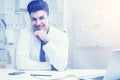 Young man at office table, toned Royalty Free Stock Photo