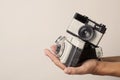 Young man with old film cameras Royalty Free Stock Photo
