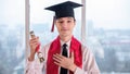 Young man at online university graduation