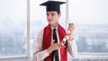 Young man at online university graduation