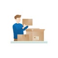 Young man open the package Royalty Free Stock Photo