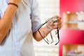 Young man at optician with glasses Royalty Free Stock Photo