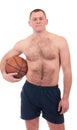 Young man with orange basket ball Royalty Free Stock Photo