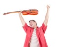 Young man with orange electric guitar