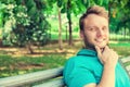 Young man outdoors with park background Royalty Free Stock Photo
