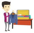 Young man packing his suitcase vector illustration