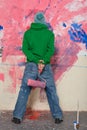 Young man painting a wall Royalty Free Stock Photo