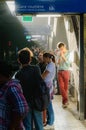 Young man in Paris on platform on railway station in sun ray. Tourist using subway or intercity train in France. France, Paris, Royalty Free Stock Photo