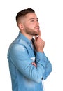 Young man with pensive profile, isolated over white background