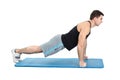 Young man performing push-ups exercise on fists Royalty Free Stock Photo