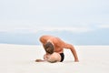 Young man performing yoga pose Baddha Konasana Royalty Free Stock Photo