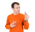 Young man with pills in hand Royalty Free Stock Photo