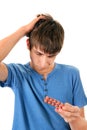 Young Man with the Pills Royalty Free Stock Photo