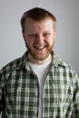 Young man in a plaid shirt Royalty Free Stock Photo