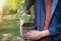 The young man is planting tree to preserve environment Royalty Free Stock Photo