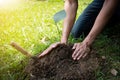 The young man is planting the tree to preserve environment Royalty Free Stock Photo