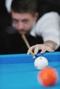 Young man play pro billiard game Royalty Free Stock Photo