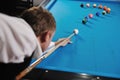 Young man play pro billiard game Royalty Free Stock Photo