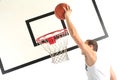 Young man playing basketball