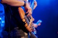 Young man playing bass live. Body.