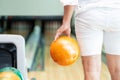 Young man playing bowling. Royalty Free Stock Photo