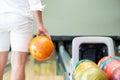 Young man playing bowling. Royalty Free Stock Photo