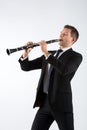 Young man playing the clarinet Royalty Free Stock Photo