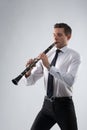 Young man playing the clarinet Royalty Free Stock Photo