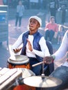 Young man playing the Djembe drum