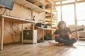 Young man playing electric guitar on floor at home Royalty Free Stock Photo