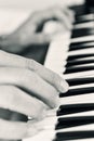 Young man playing an electronic keyboard