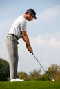 Young man playing golf Royalty Free Stock Photo