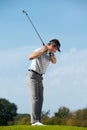 Young man playing golf Royalty Free Stock Photo