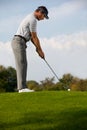 Young man playing golf Royalty Free Stock Photo