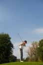 Young man playing golf Royalty Free Stock Photo