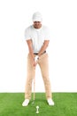 Young man playing golf on course  white background Royalty Free Stock Photo