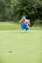 Young man playing golf Royalty Free Stock Photo