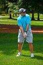 Young Man Playing a Round of Golf Royalty Free Stock Photo