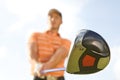 Young man playing golf, low angle view Royalty Free Stock Photo