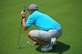 Young Man Playing Golf on the Green Royalty Free Stock Photo