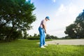 Young man playing golf Royalty Free Stock Photo