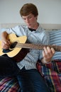 Young Man Playing Guitar Royalty Free Stock Photo